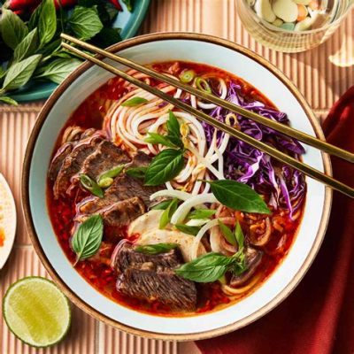   Bún Bò Huế! A Hearty Beef Noodle Soup with Aromatic Lemongrass and Spicy Chili